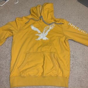 mustard yellow sweatshirt